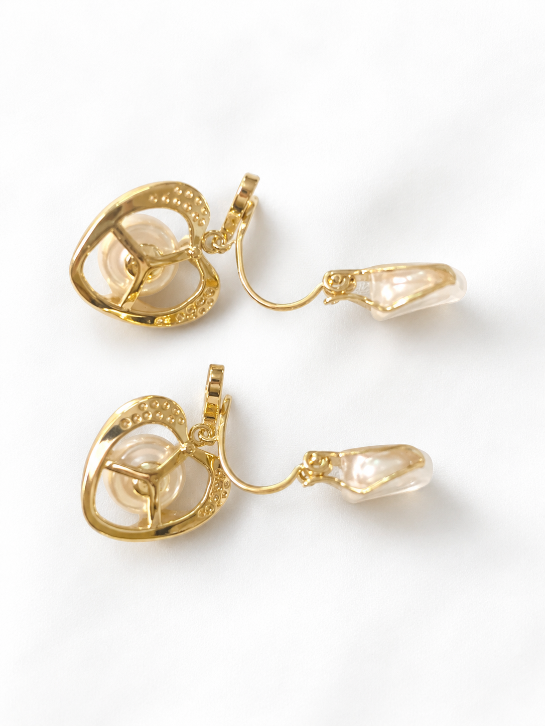 Pearl heart earrings for women featuring a lustrous white pearl, gold-tone heart frame and crystal accents