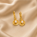 Pearl Tide Hoop Earrings by Ashaarya featuring shell-inspired pearl details, anti-tarnish comfort jewellery and lightweight hoop earrings