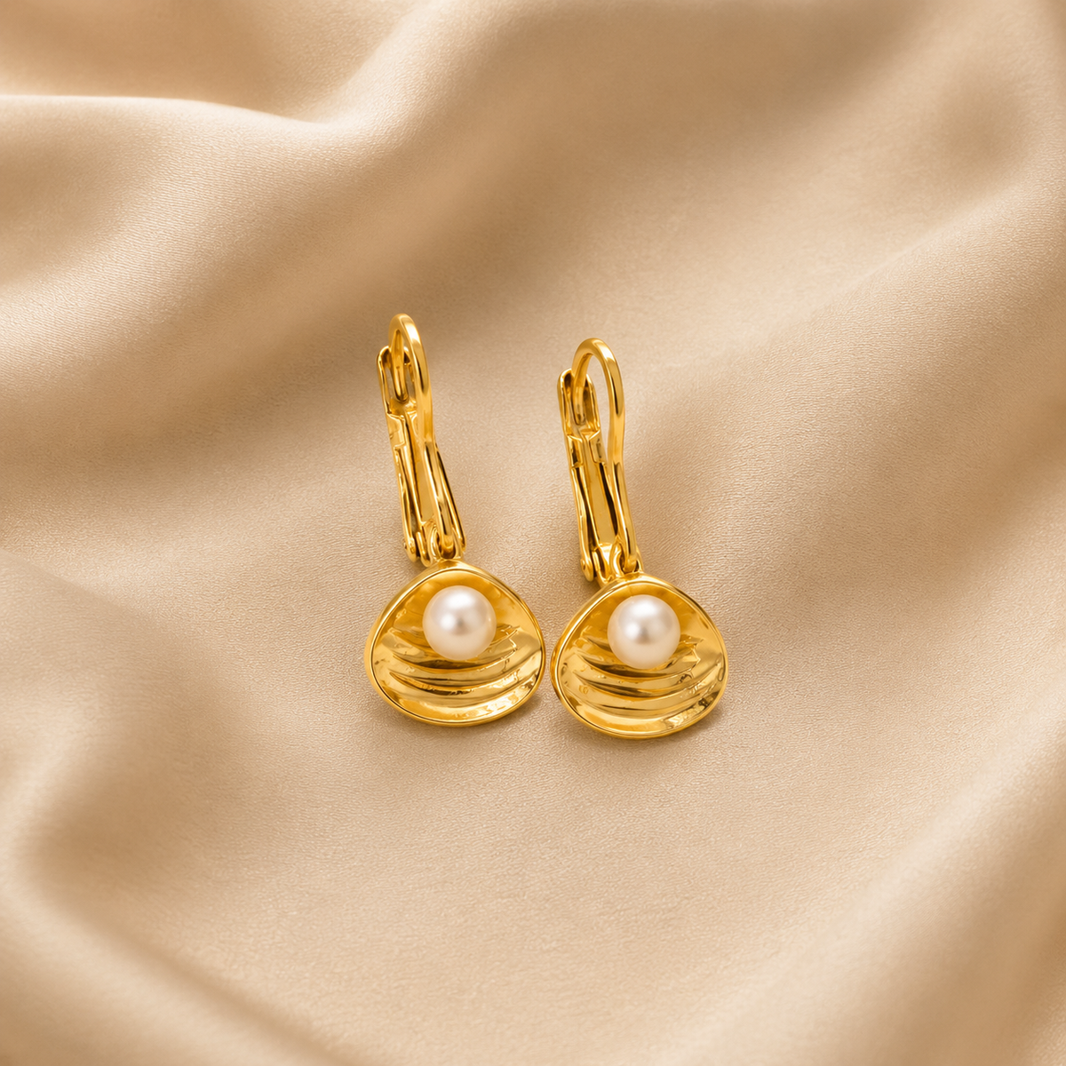 Pearl Tide Hoop Earrings by Ashaarya featuring shell-inspired pearl details, anti-tarnish comfort jewellery and lightweight hoop earrings