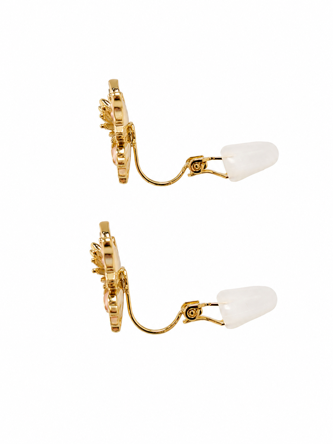 A pair of gold-toned ear cuffs with white teardrop-shaped stone accents, displayed on a clean white background. Pink butterfly earrings for girls with lightweight gold-tone design