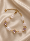 Pink gemstone bracelet for women featuring natural-looking pink stones, sparkling floral accents and a refined demi-fine jewellery design