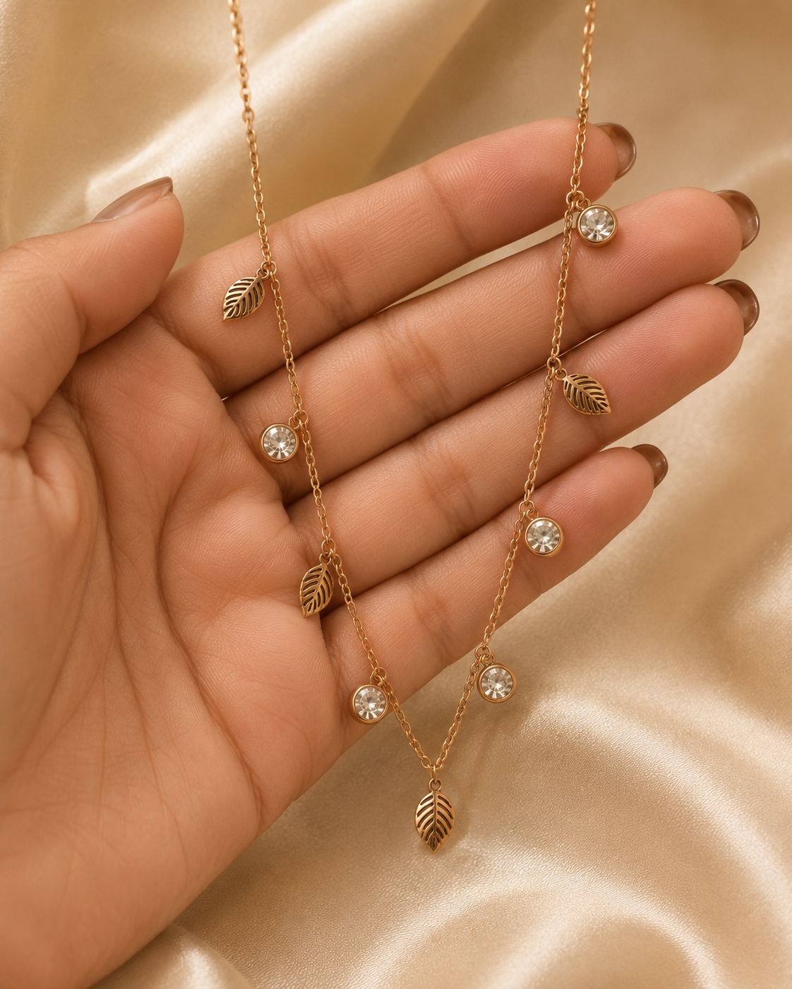 rose gold necklace for women, anti tarnish necklace, leaf pendant necklace, nature inspired necklace, lightweight necklace for women, stainless steel necklace, 18kt rose gold necklace, dainty necklace for women, everyday necklace, minimalist jewellery, comfort jewellery, waterproof necklace, skin friendly necklace, Ashaarya necklace