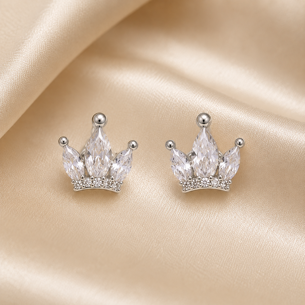 royal trio earrings set, crown earrings for women, silver crown earrings, crown stud earrings, crown drop earrings, stud earrings for women, anti tarnish earrings, stainless steel earrings, lightweight earrings, skin friendly earrings, hypoallergenic earrings, cubic zirconia earrings, silver earrings for girls, everyday earrings, party wear earrings, elegant stud earrings, dainty earrings, premium earrings for women, earrings combo set, three pair earrings set, trendy earrings for women, comfortable earring
