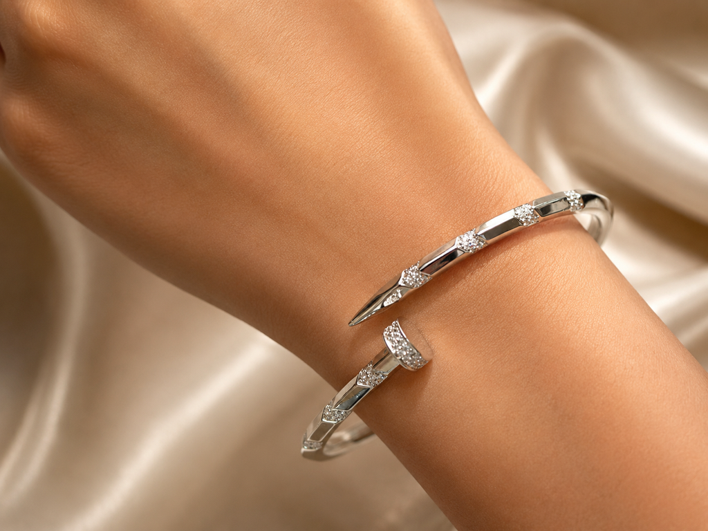 Silver open cuff bracelet for women with a minimalist polished band and crystal accents for elegant everyday wear