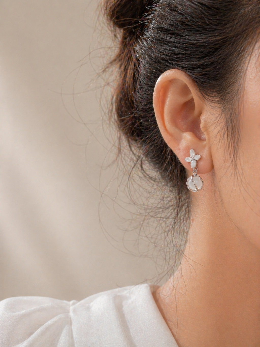 Model wearing Noctra star clip-on earrings, lightweight dangling clip-on earrings for women, anti-tarnish comfort jewellery by Ashaarya
