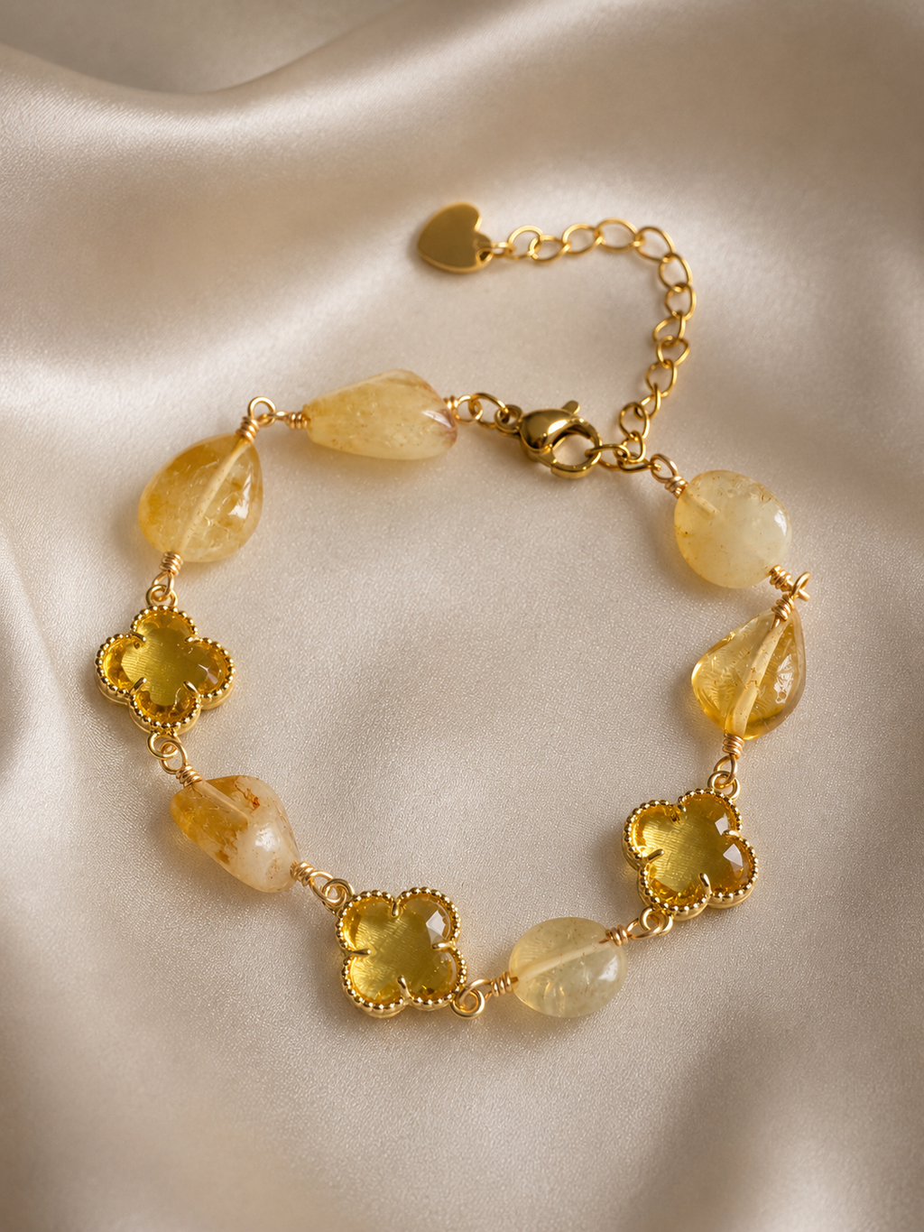 Yellow natural stone bracelet for women with floral-inspired crystal accents and a gold-tone chain, perfect for everyday wear